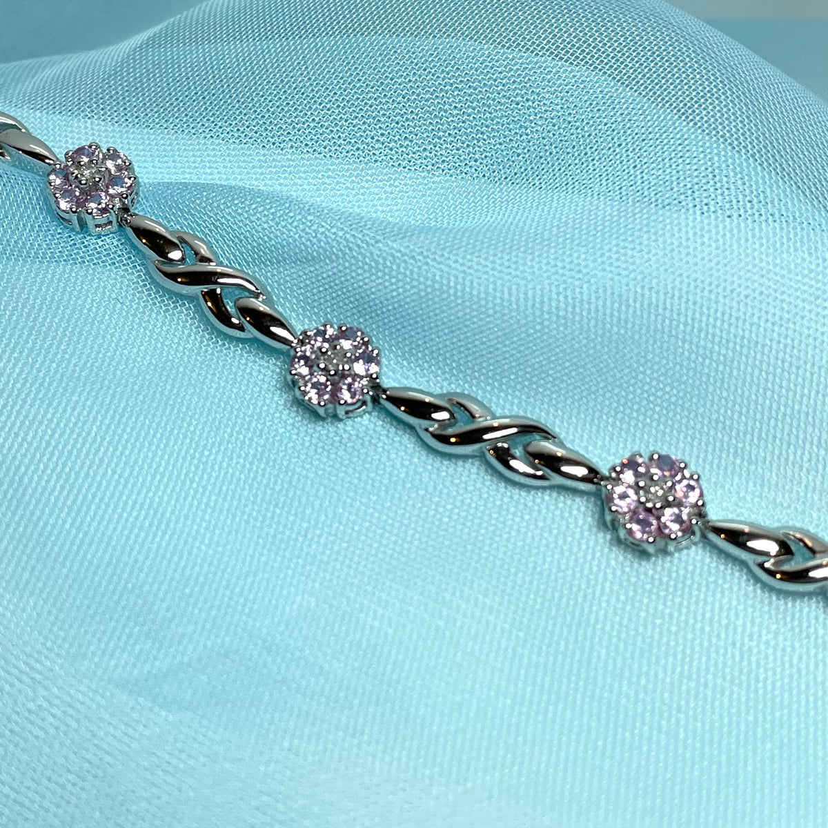 Real pink sapphire and diamond white gold daisy flower bracelet