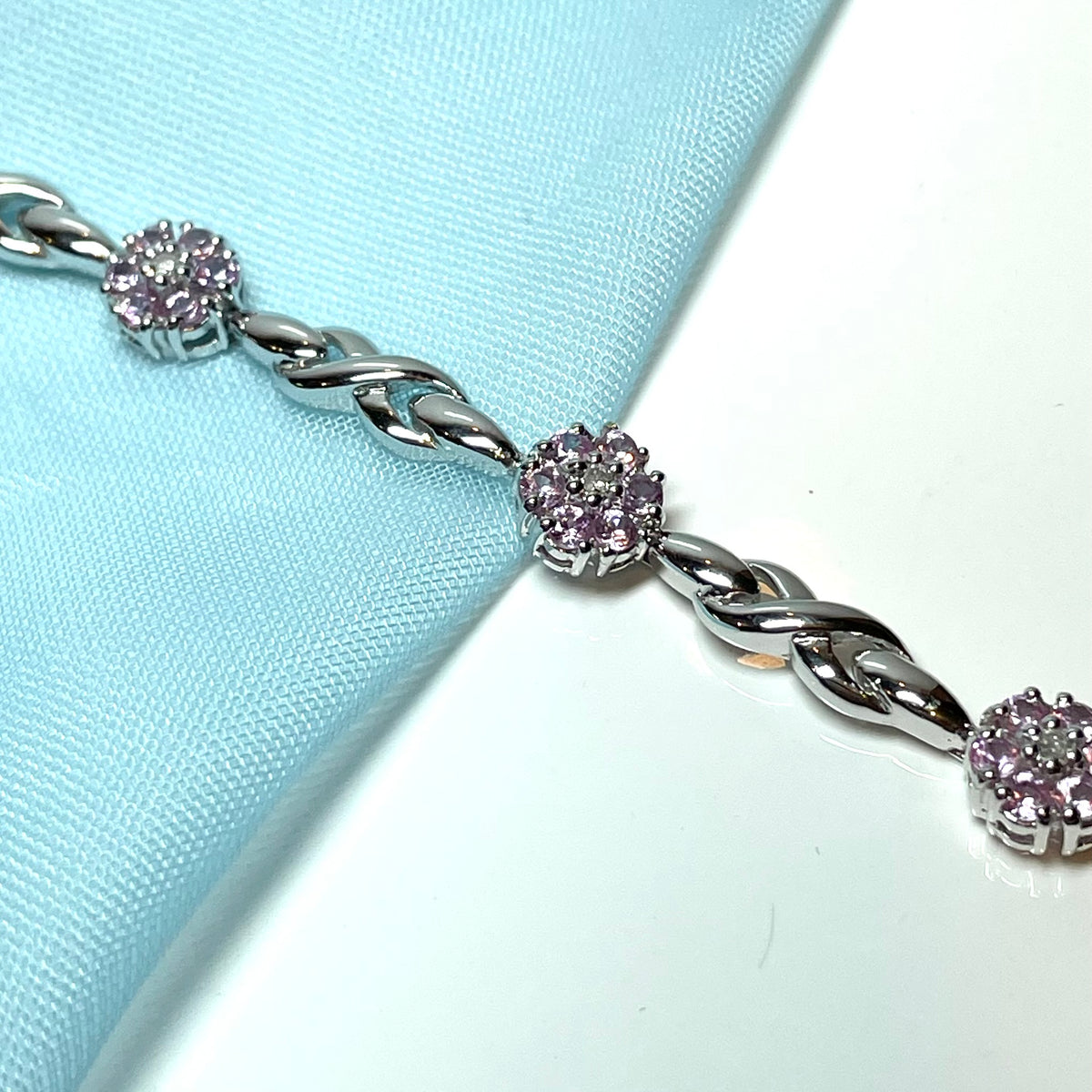Real pink sapphire and diamond white gold daisy flower bracelet
