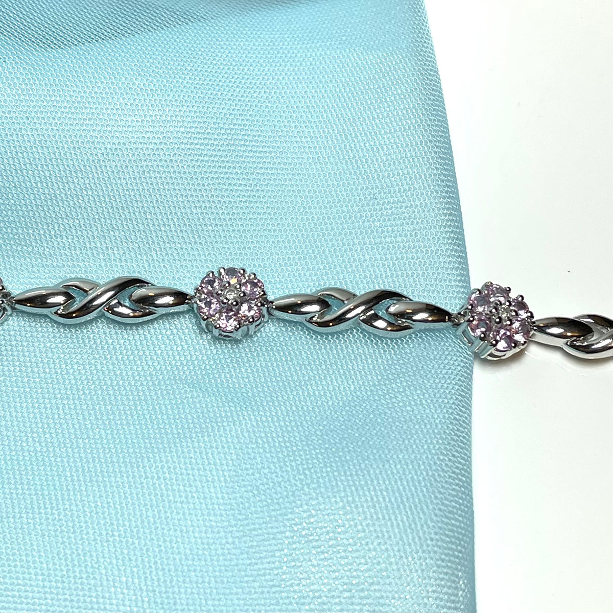 Real pink sapphire and diamond white gold daisy flower bracelet