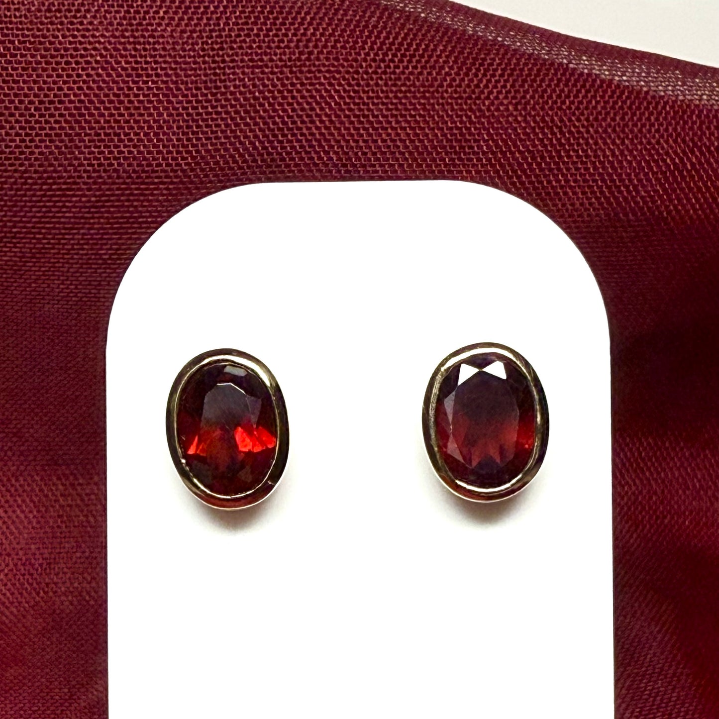 Real red garnet stud earrings yellow gold oval rubbed over smooth setting