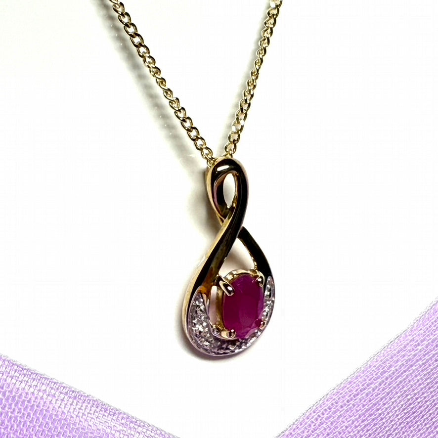 Real red ruby and diamond pierced necklace yellow gold