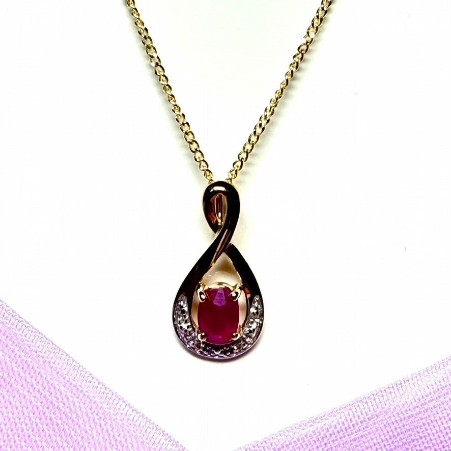 Real red ruby and diamond pierced necklace yellow gold
