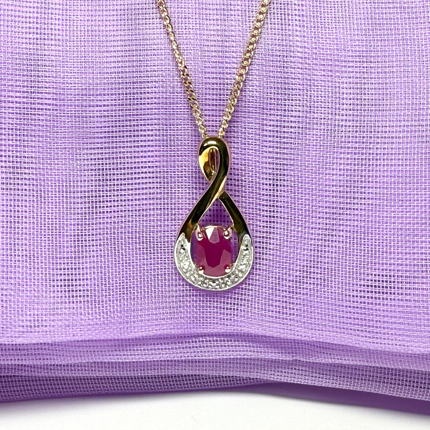 Real red ruby and diamond pierced necklace yellow gold