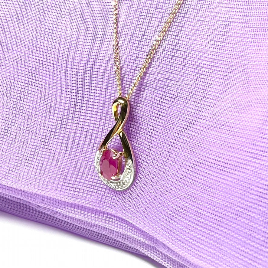 Real red ruby and diamond pierced necklace yellow gold