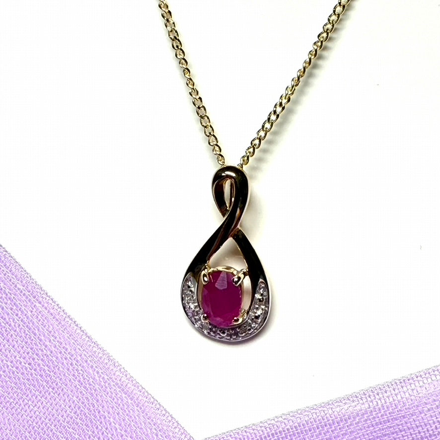 Real red ruby and diamond pierced necklace yellow gold
