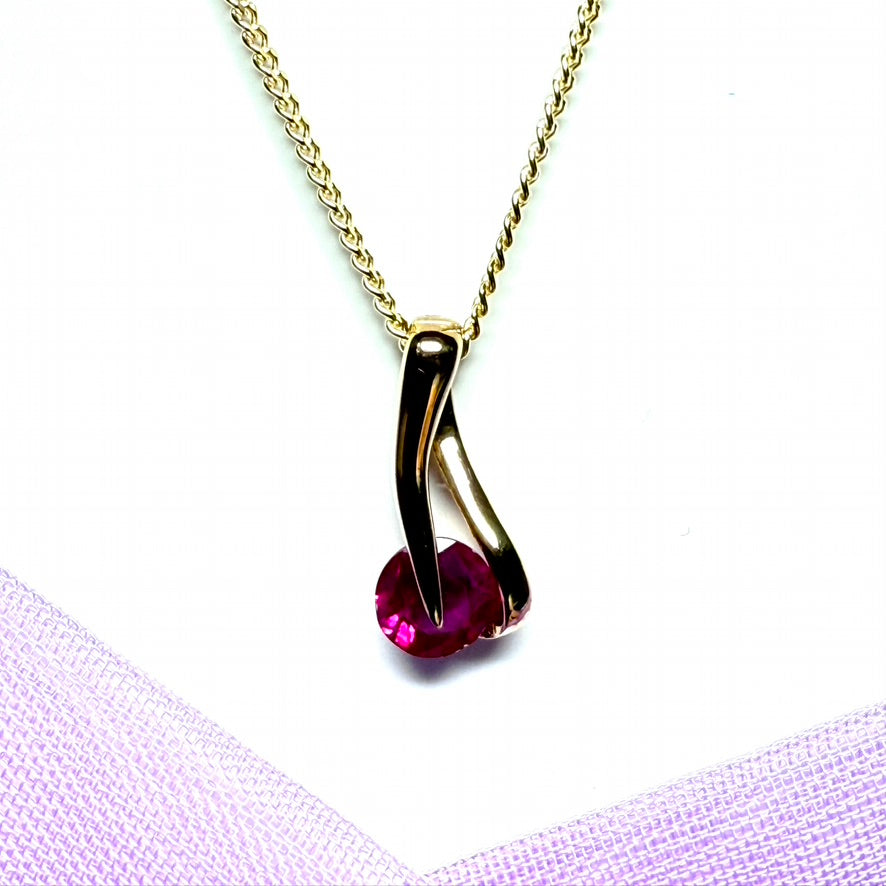 Real red ruby yellow gold fancy swirl shaped necklace