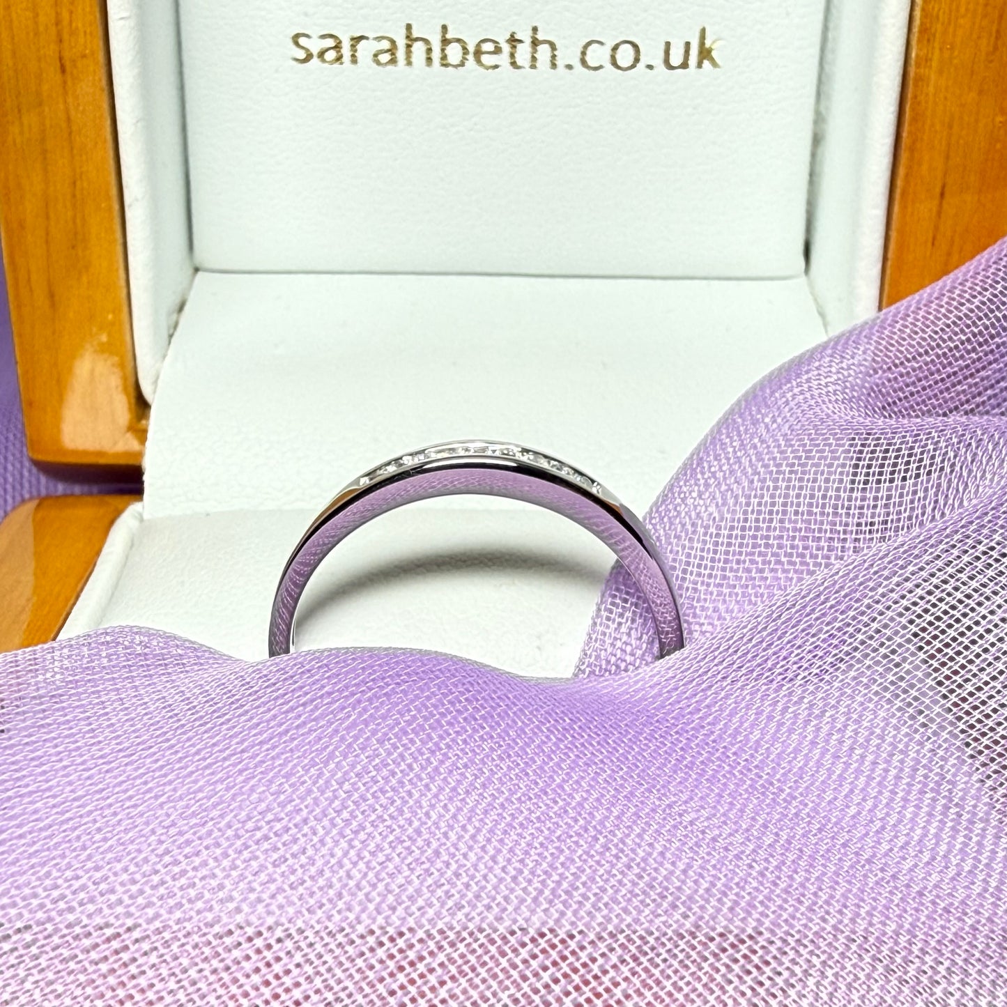 Real round cut diamond channel set eternity ring 10 points white gold