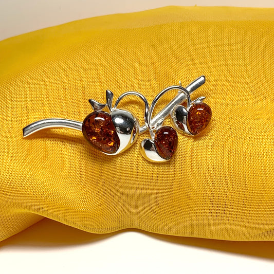 Real amber triple heart shaped and sterling silver brooch