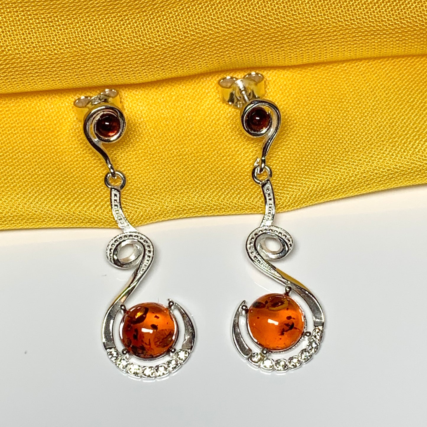 Real amber round drop earrings sterling silver fancy swirl