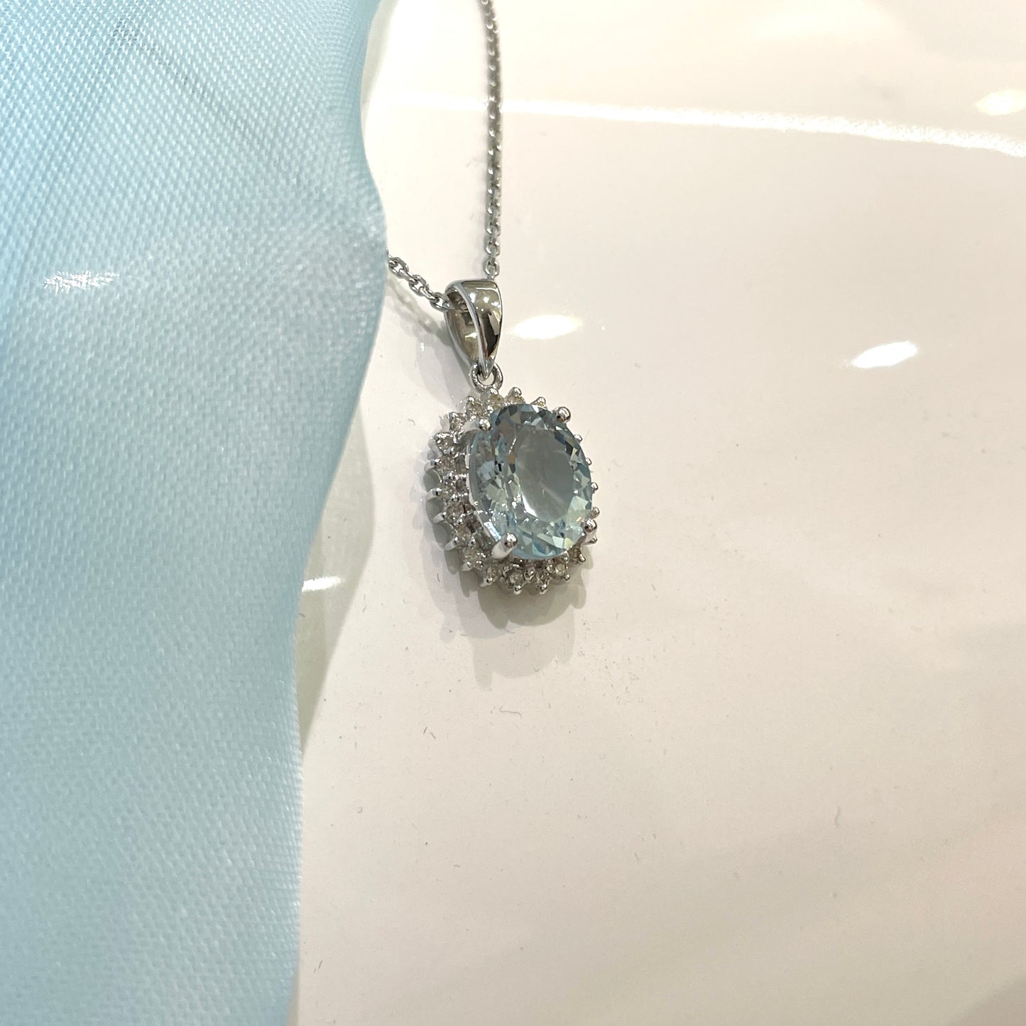 Real aquamarine oval necklace and diamond white gold necklace