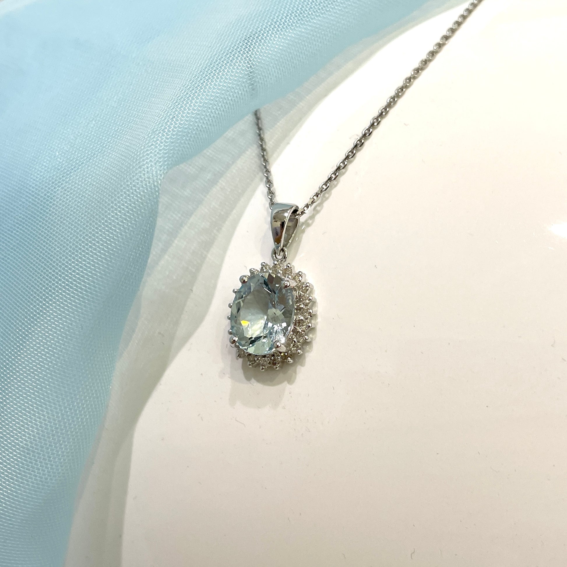 Real aquamarine oval necklace and diamond white gold necklace