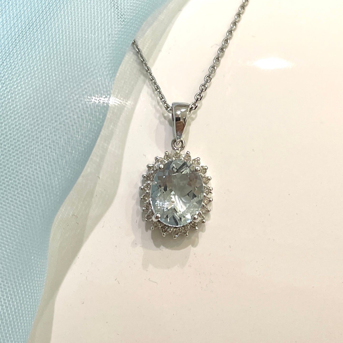 Real aquamarine oval necklace and diamond white gold necklace