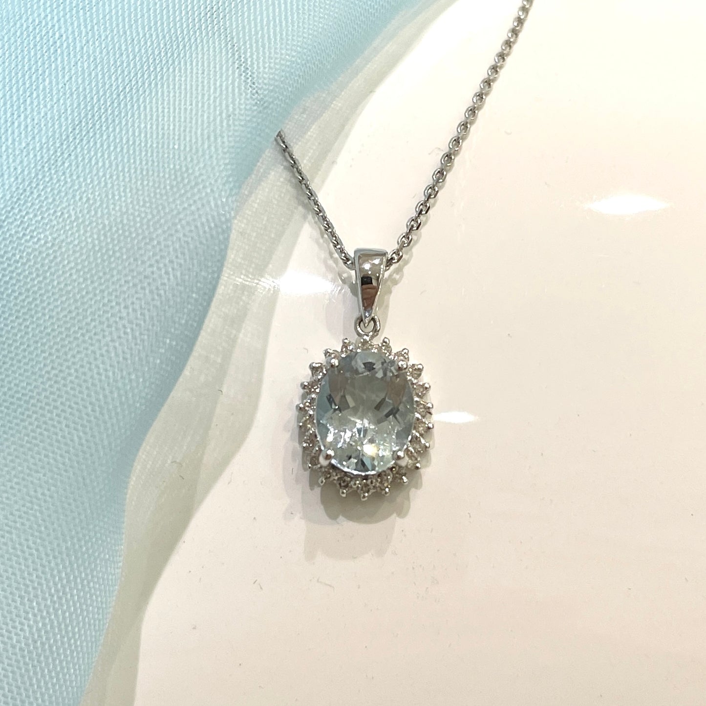 Real aquamarine oval necklace and diamond white gold necklace