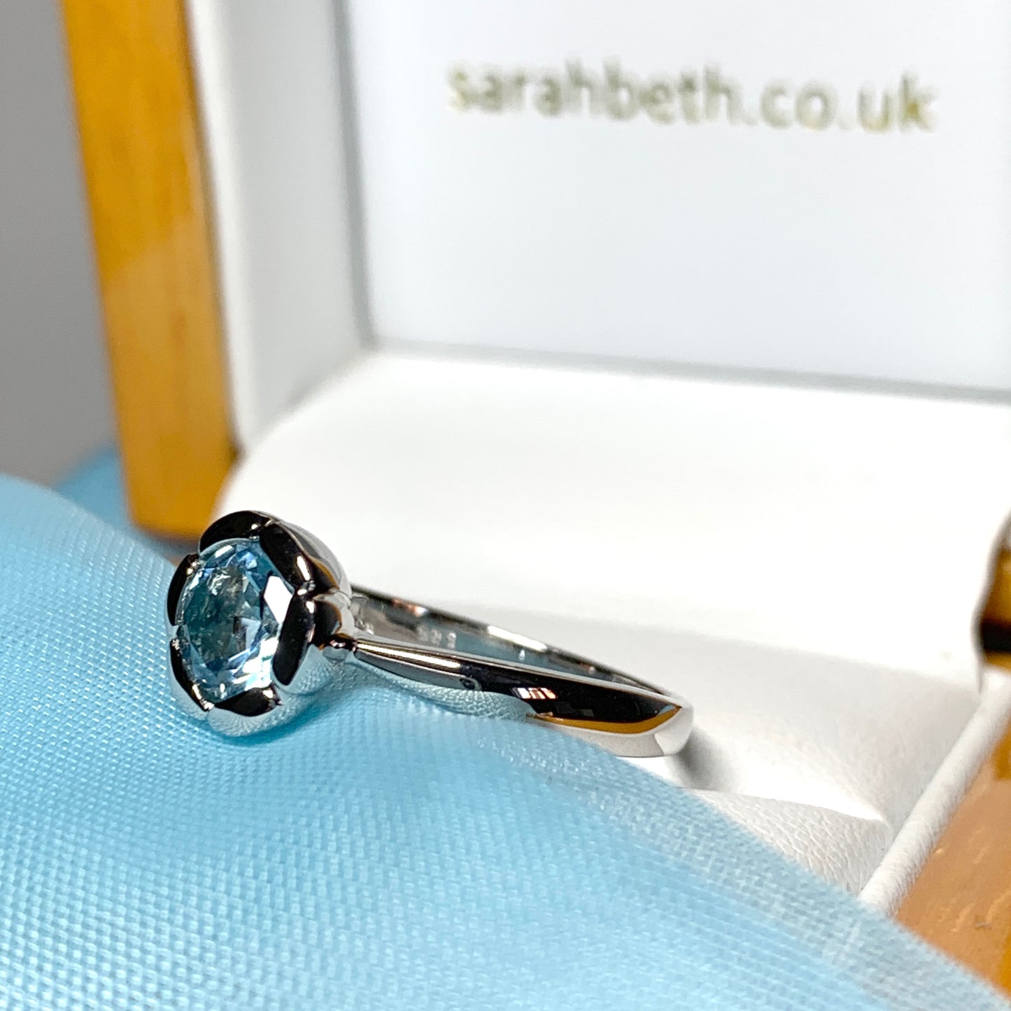 Real blue topaz dress ring ladies fancy flower edged round