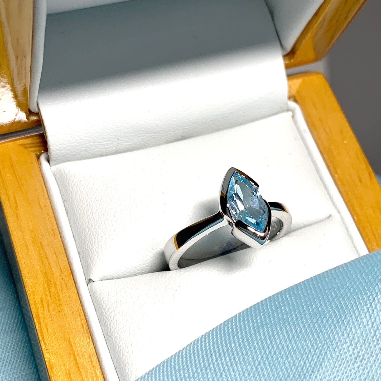 Real blue topaz ladies marquise shaped dress ring