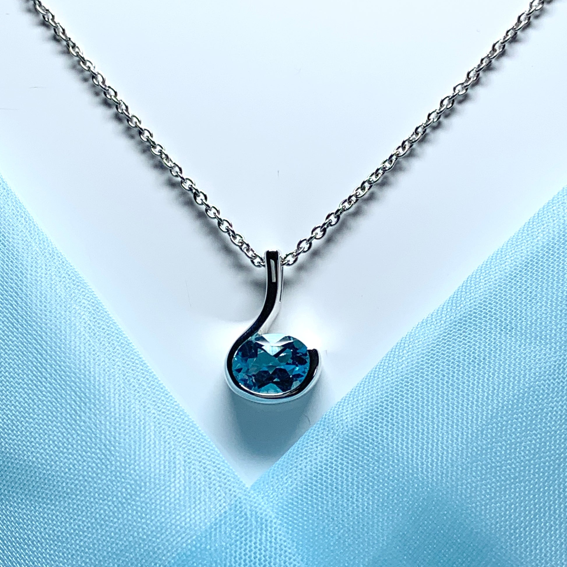 Real blue topaz necklace oval fancy swirl sterling silver