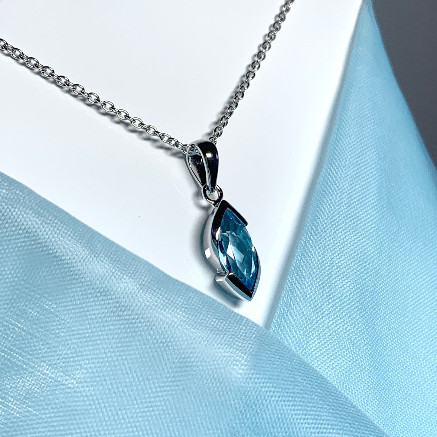 Real blue topaz necklace pendant marquise smooth rubbed over setting