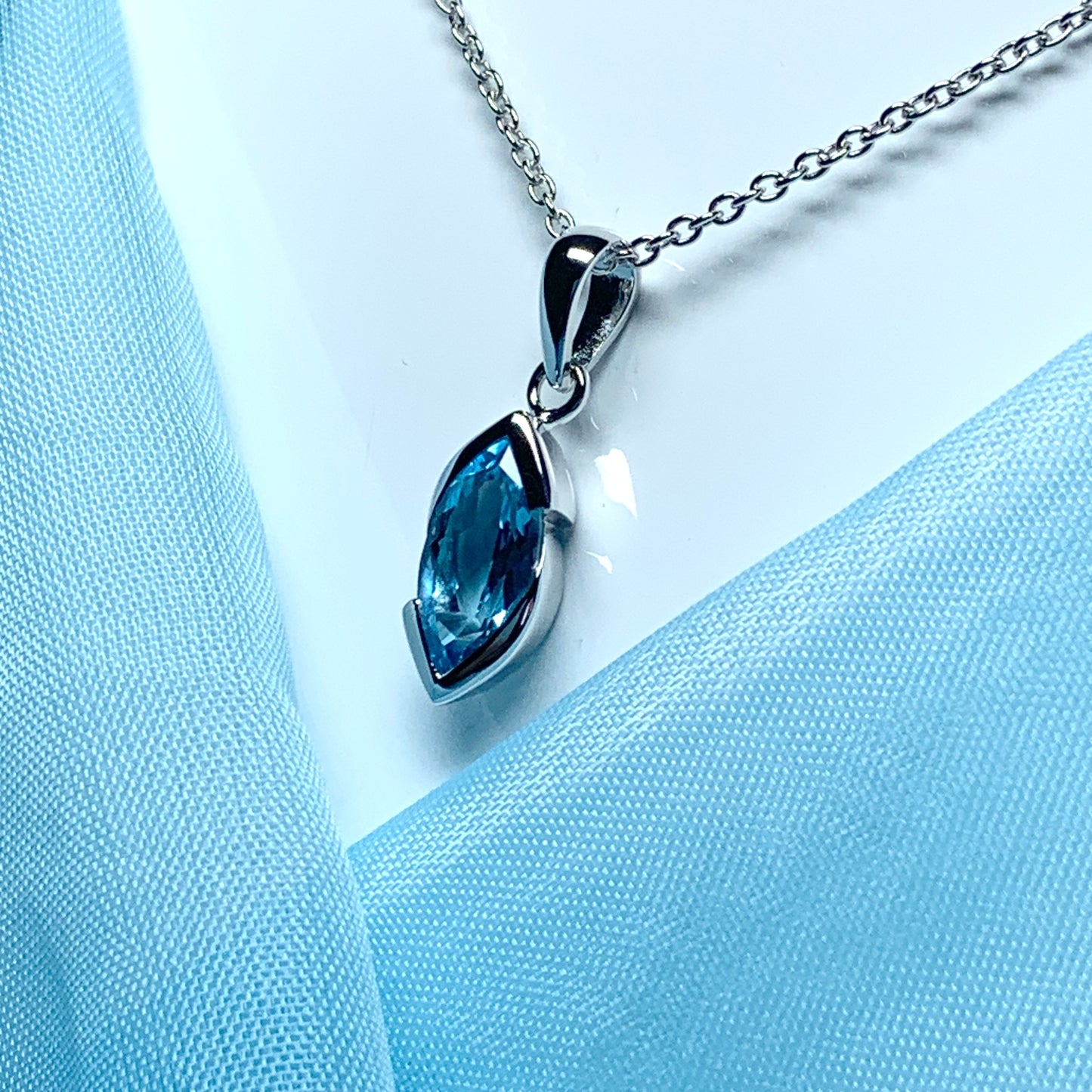 Real blue topaz necklace pendant marquise smooth rubbed over setting