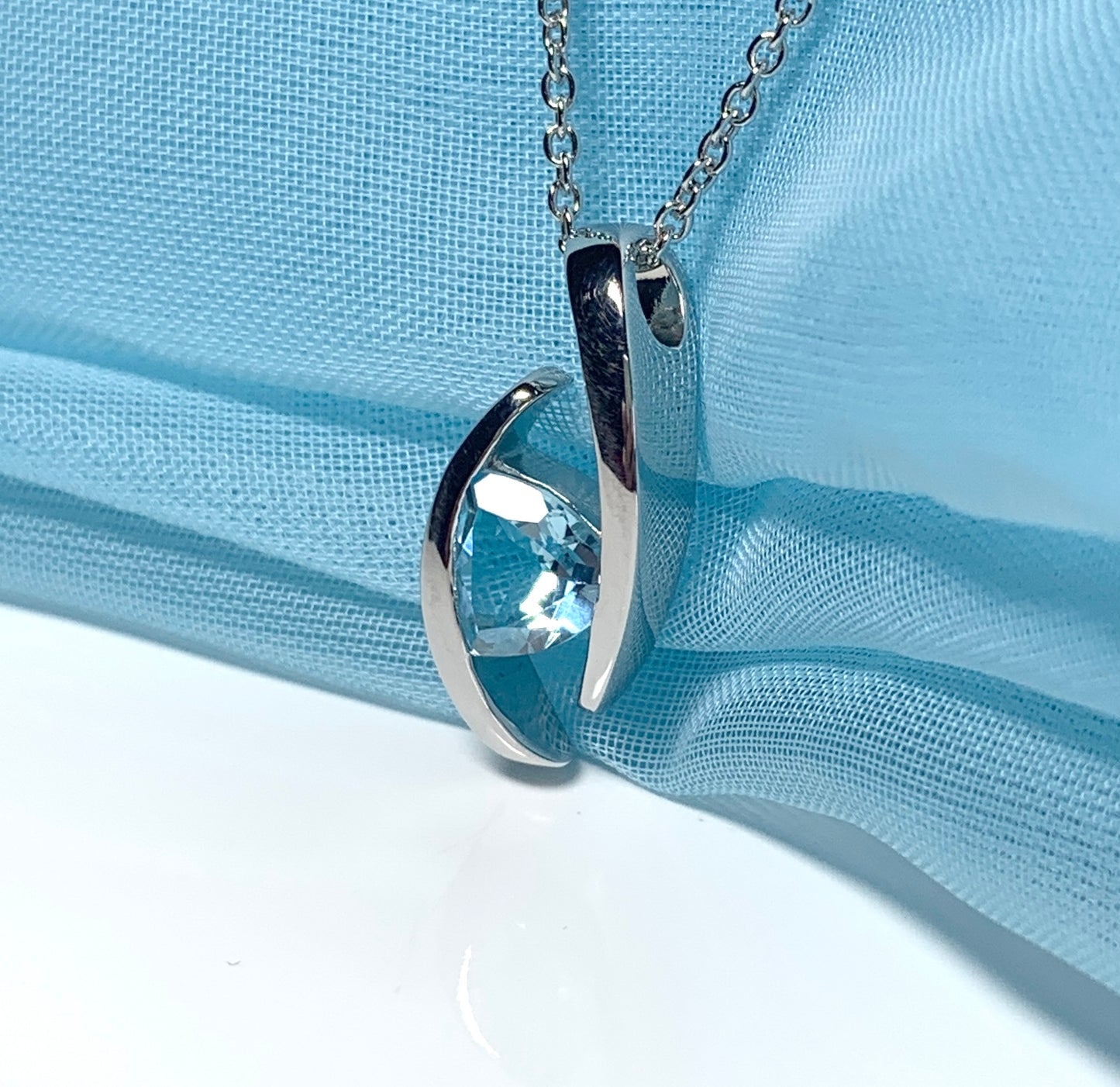 Real blue topaz necklace pendant triangle smooth rubbed over setting