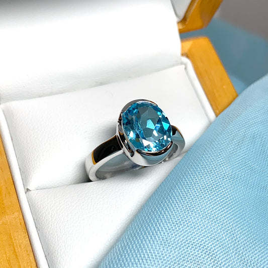Real blue topaz oval dress ring sterling silver