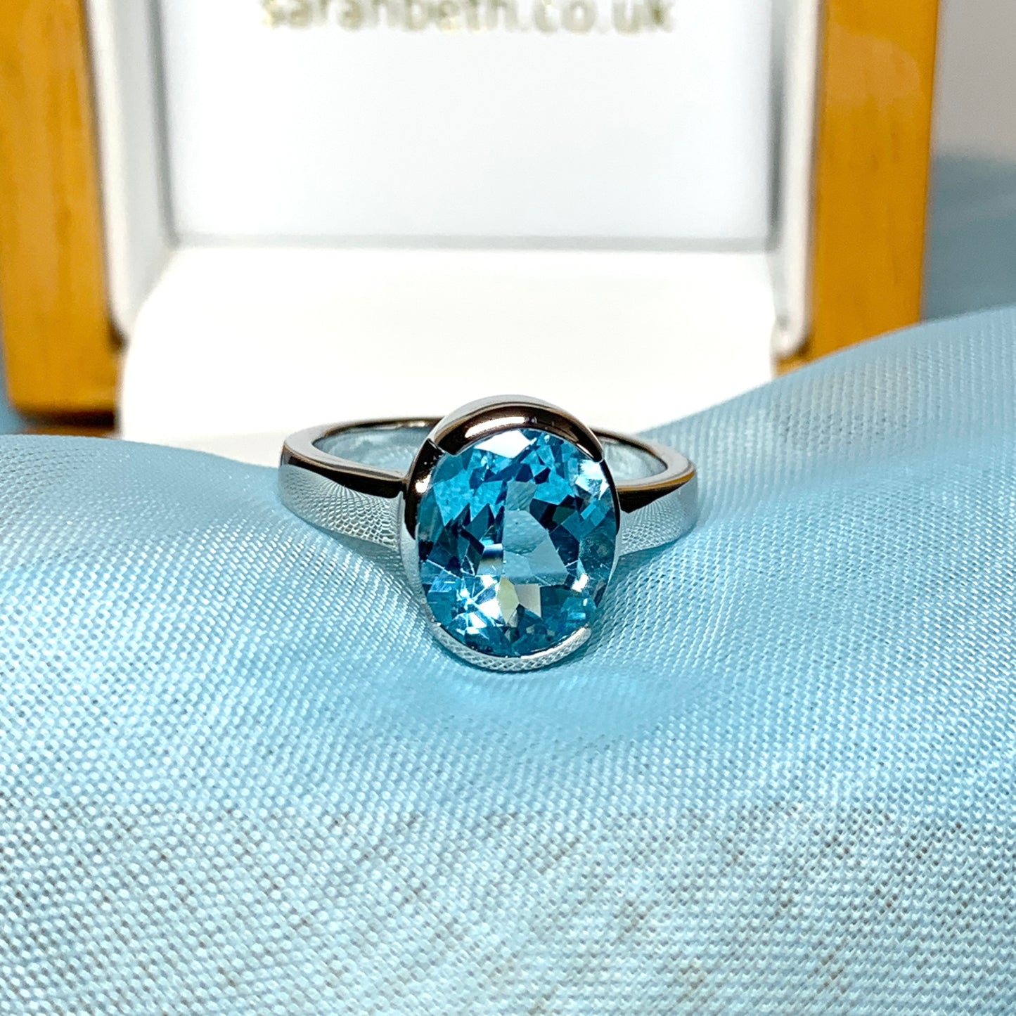 Real blue topaz oval dress ring sterling silver