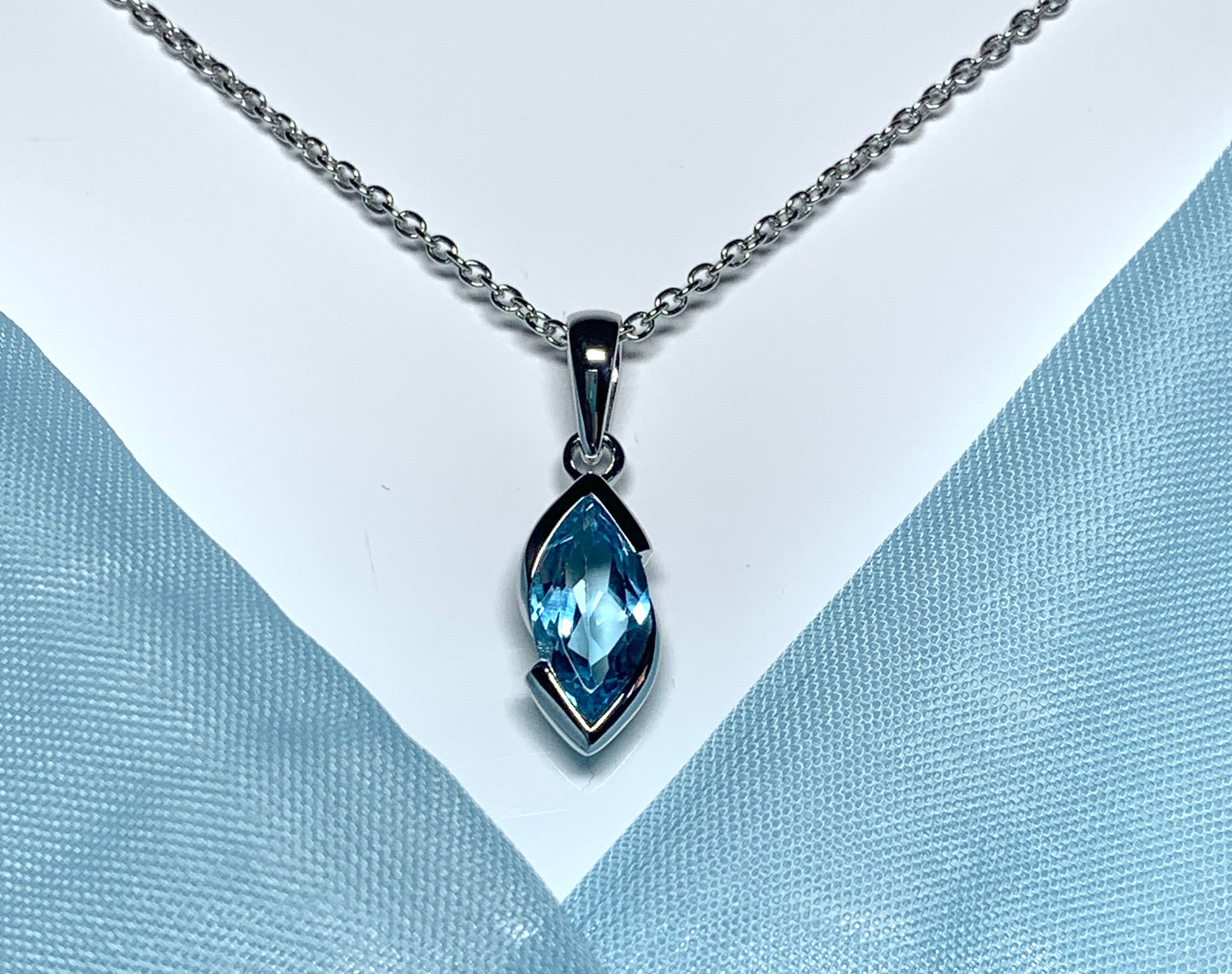 Real blue topaz necklace pendant marquise smooth rubbed over setting