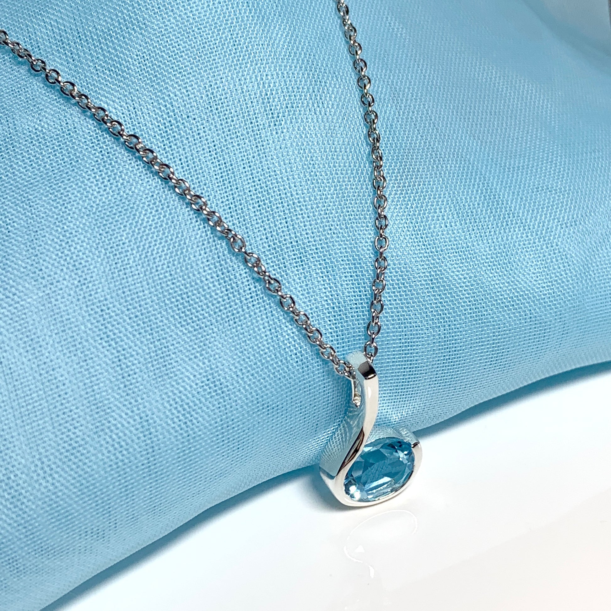 Real blue topaz necklace oval fancy swirl sterling silver