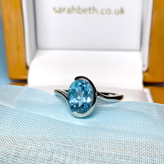 Real blue topaz ring fancy oval swirl sterling silver