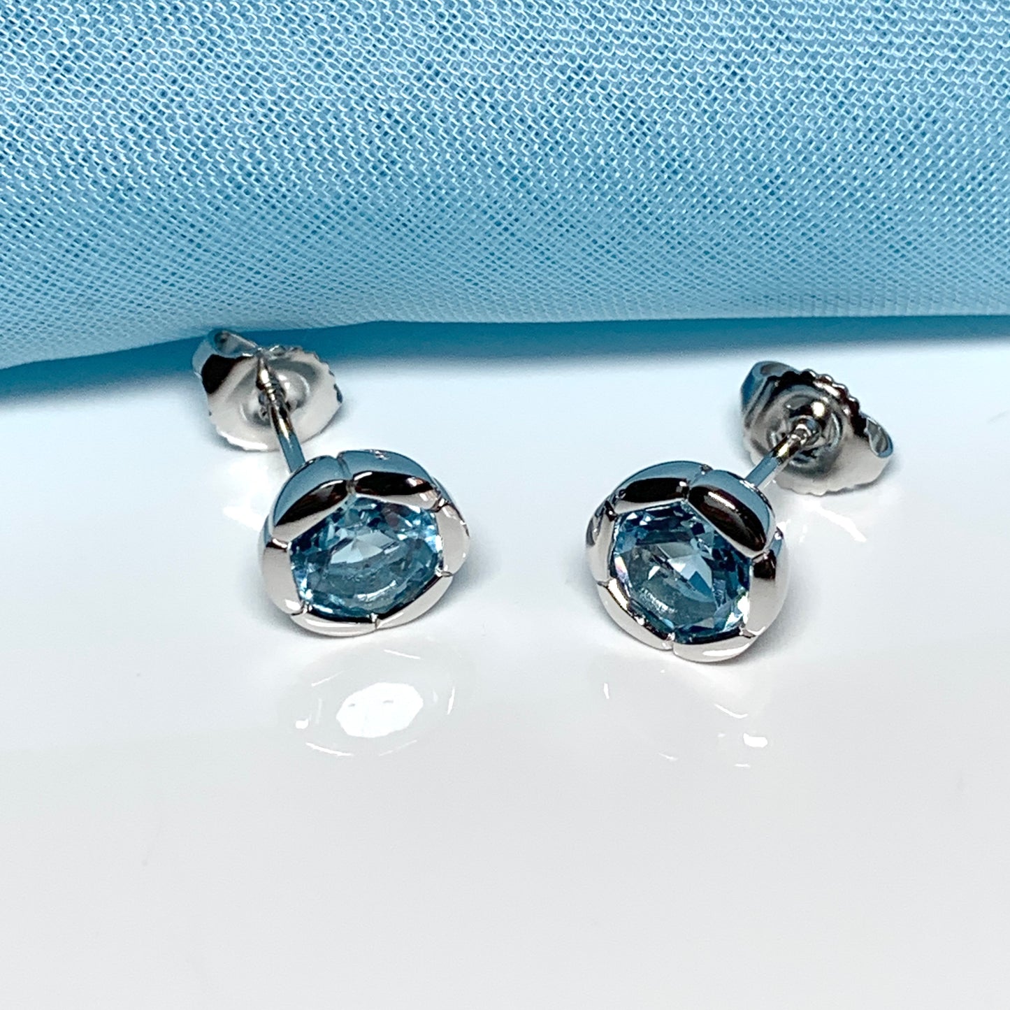 Real blue topaz stud earrings fancy flower edged round