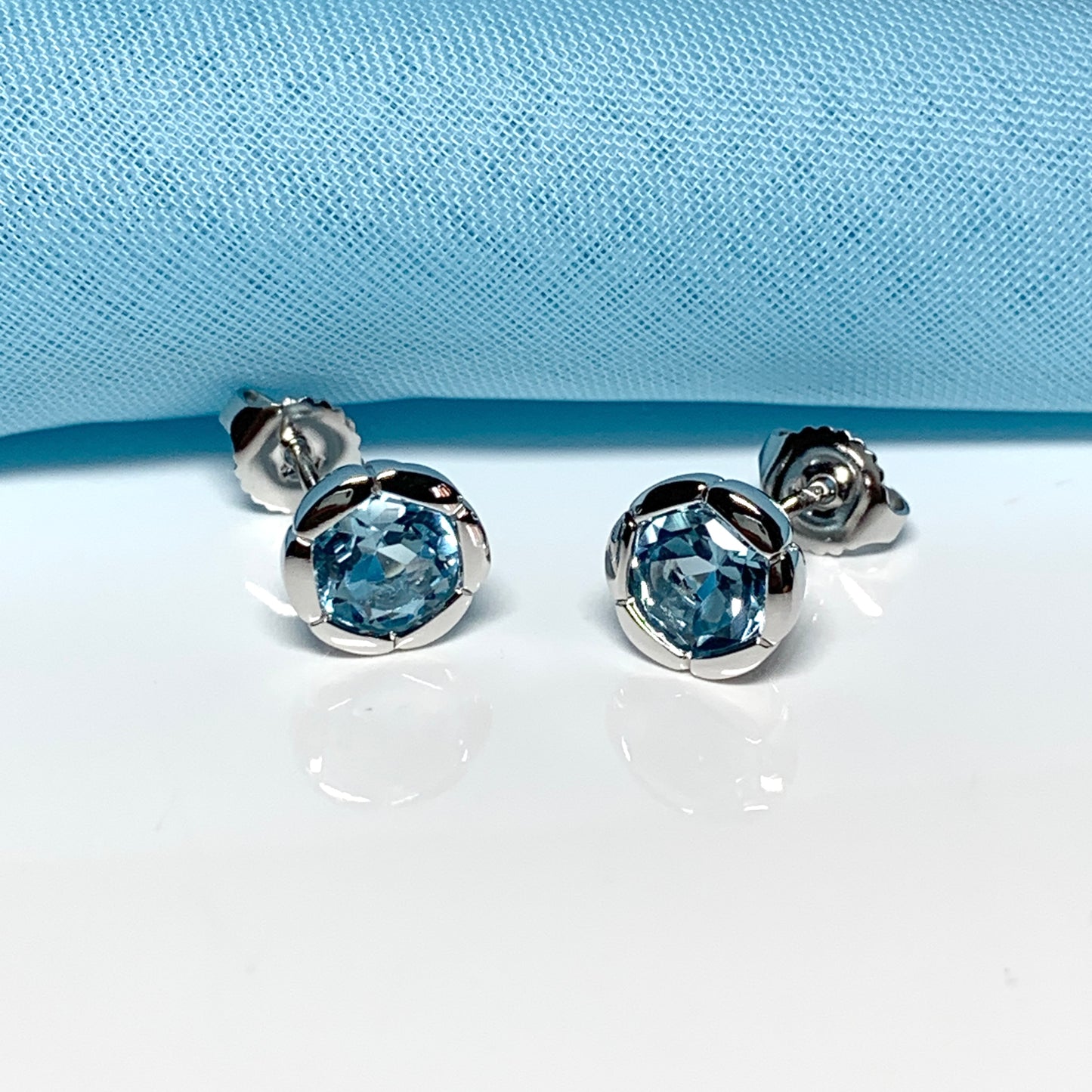 Real blue topaz stud earrings fancy flower edged round