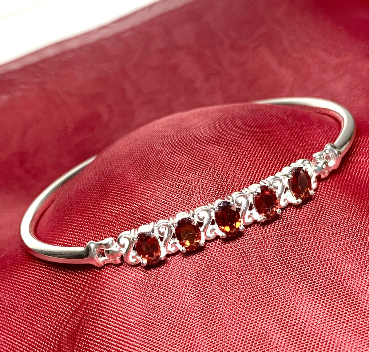 Real garnet oval sterling silver set bangle