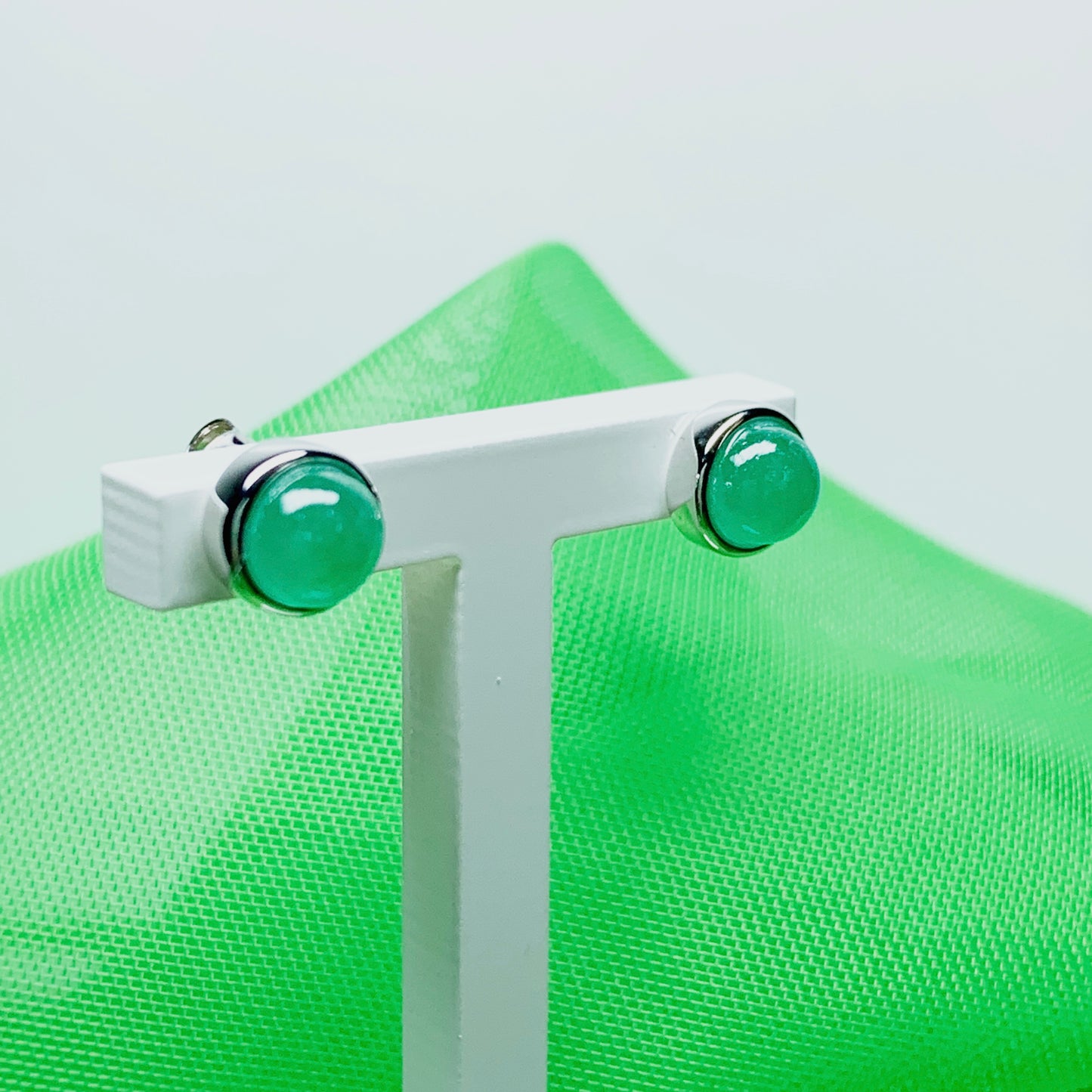 Real jade stud earrings green round rubbed over smooth setting white gold