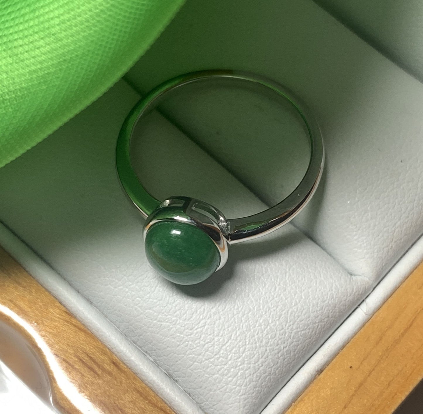 Real jade ring green oval white gold rubbed over smooth setting