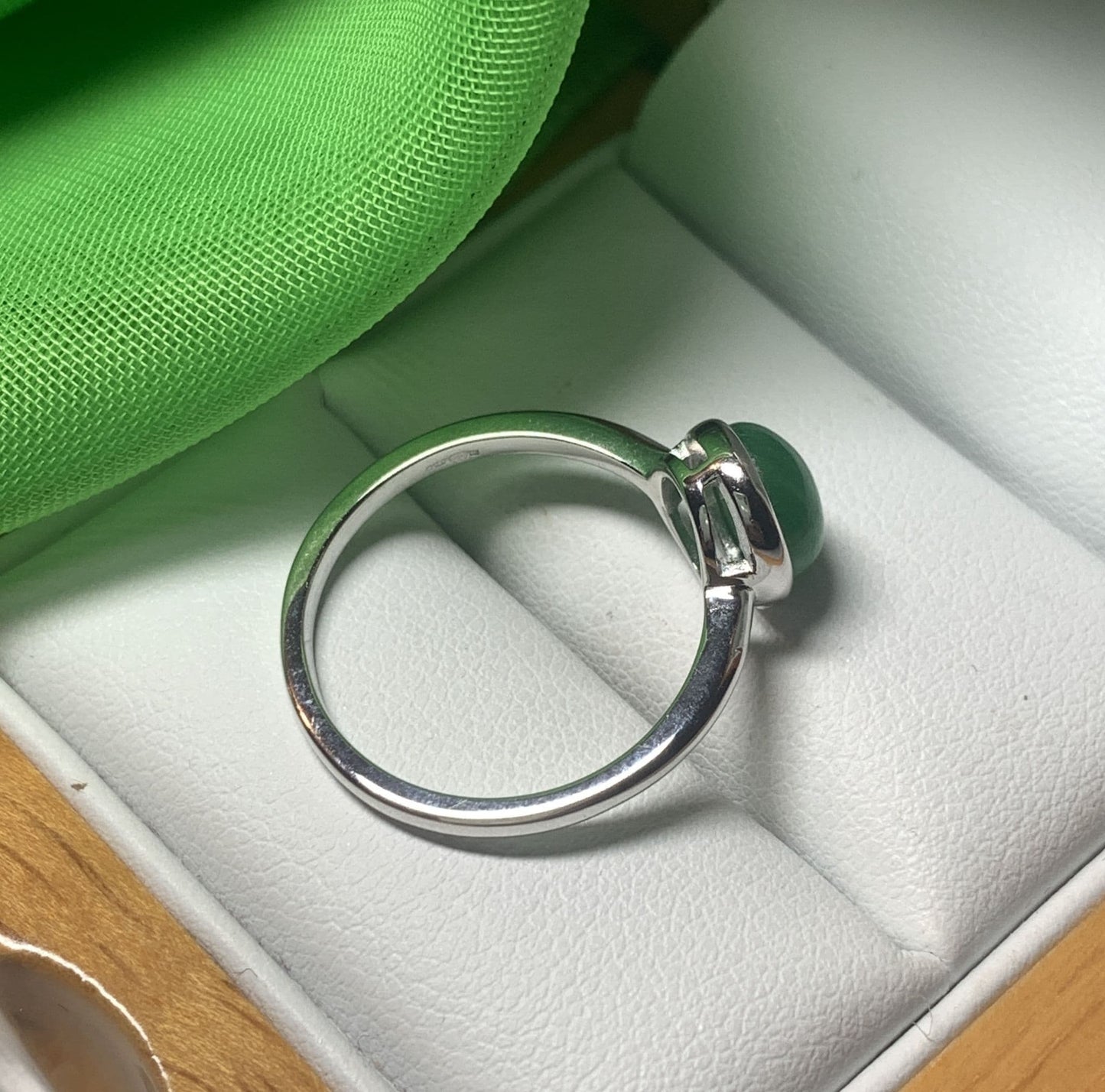 Real jade ring green oval white gold rubbed over smooth setting