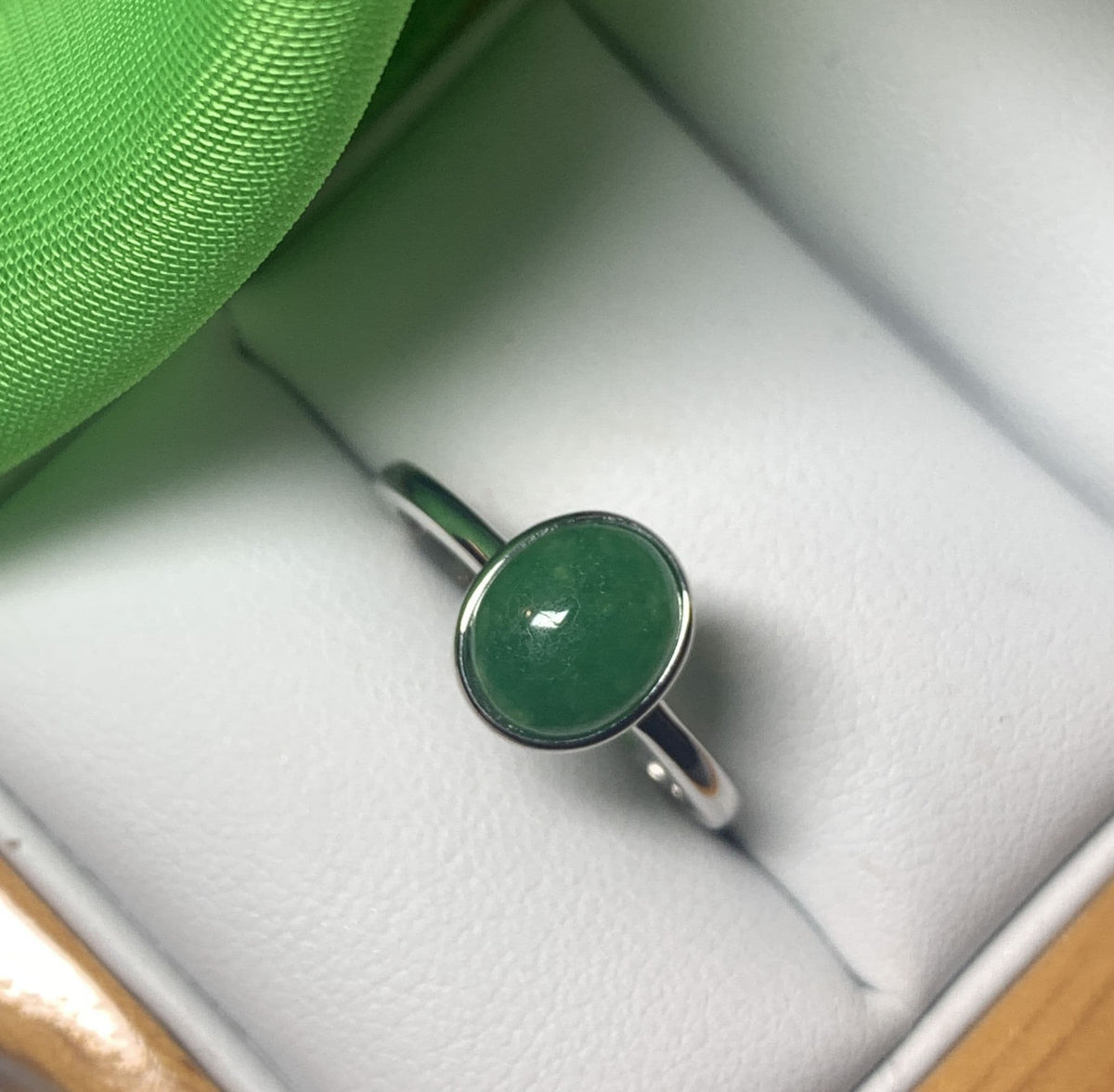 Real jade ring green oval white gold rubbed over smooth setting