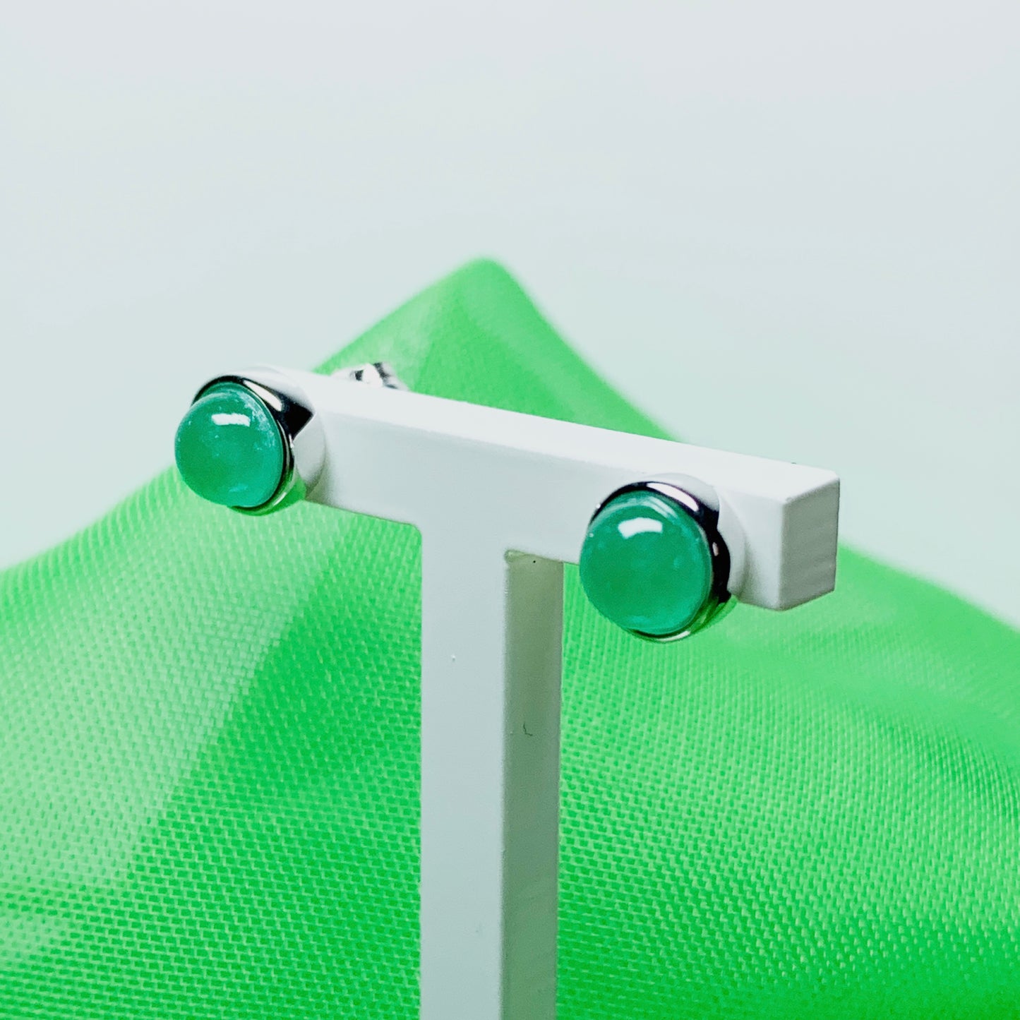 Real jade stud earrings green round rubbed over smooth setting white gold