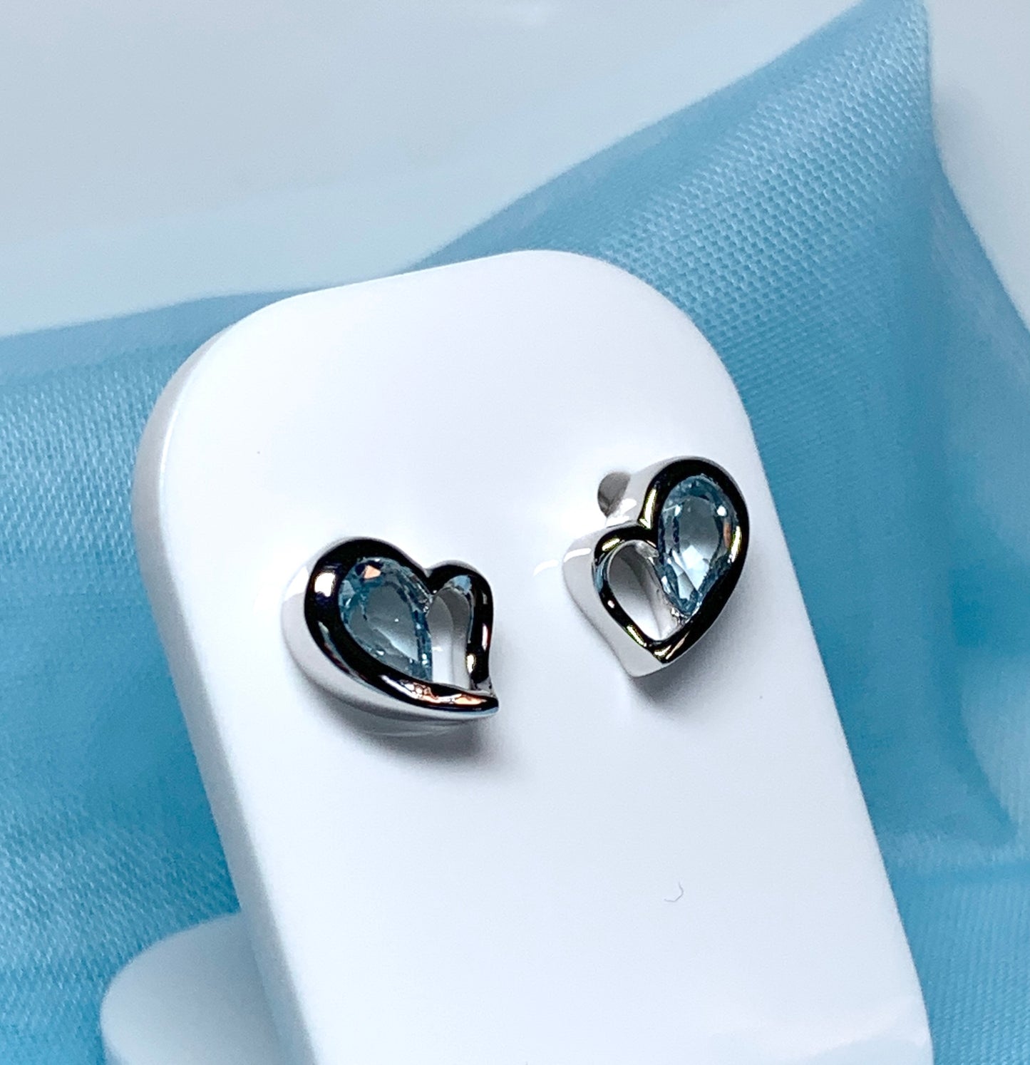 Real light blue topaz heart shaped stud earrings sterling silver