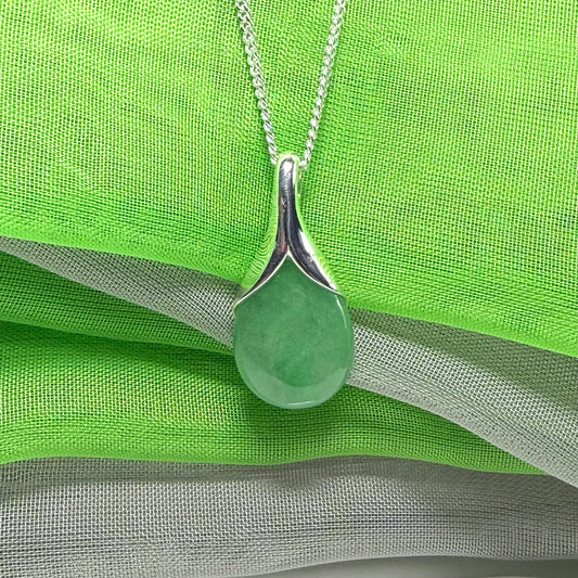 A really stunning real green jade necklace in a teardrop, a timeless design