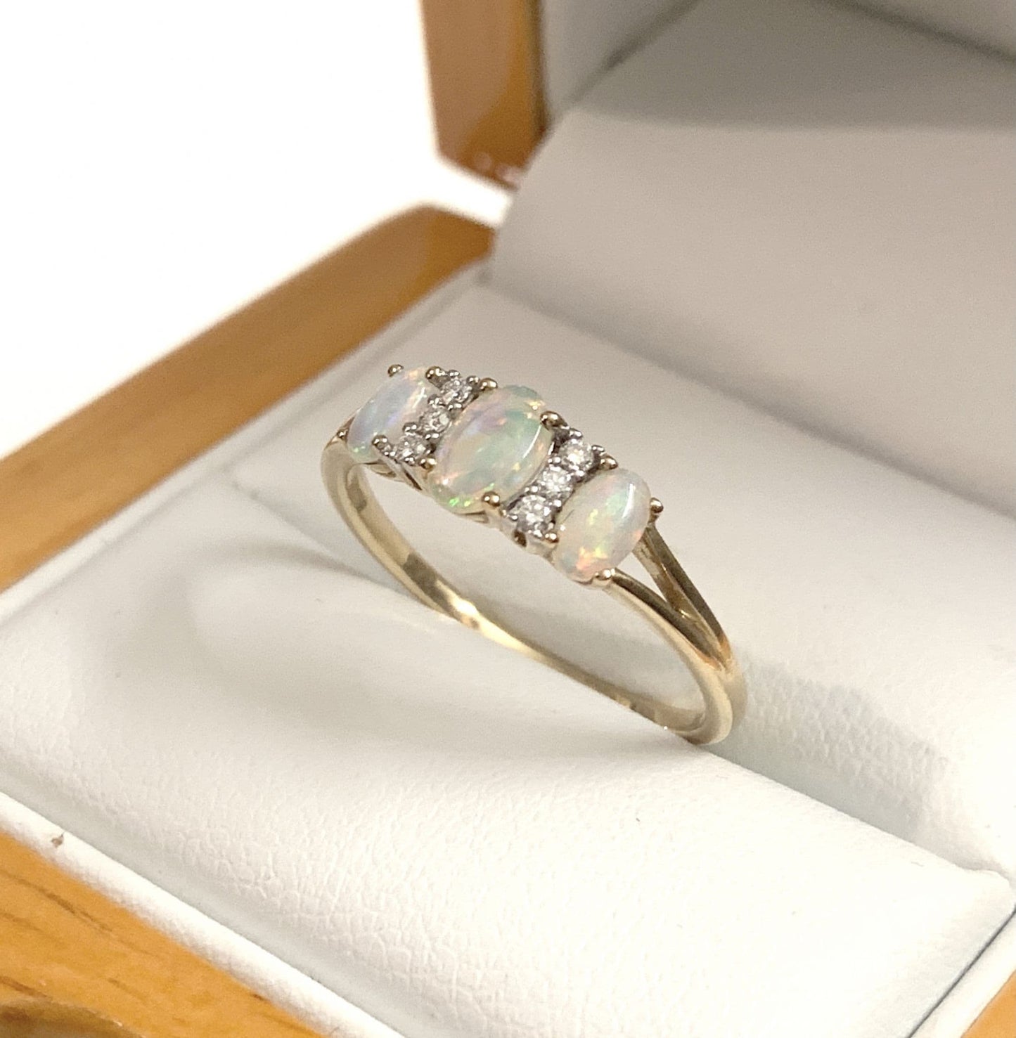 Real opal and diamond trilogy dress ring