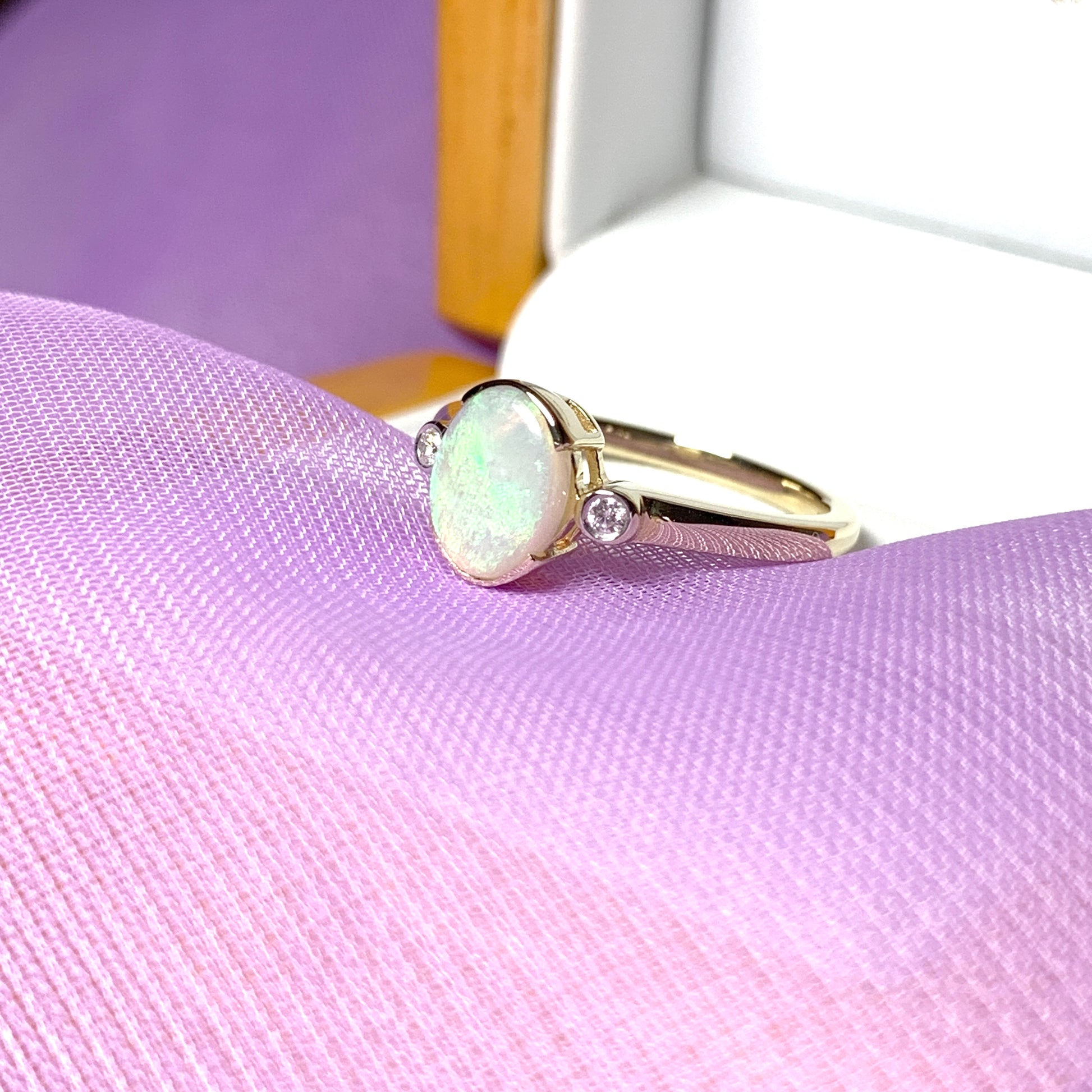 Real opal ring with diamond oval yellow gold