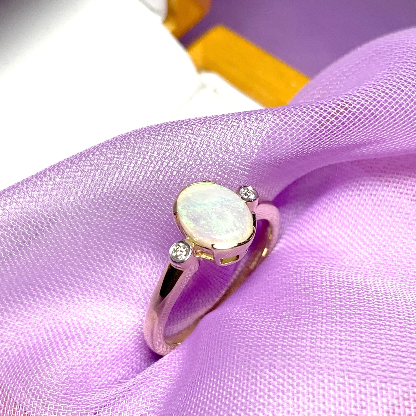 Real opal ring with diamond oval yellow gold