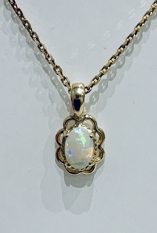 Real opal yellow gold oval fancy edged necklace
