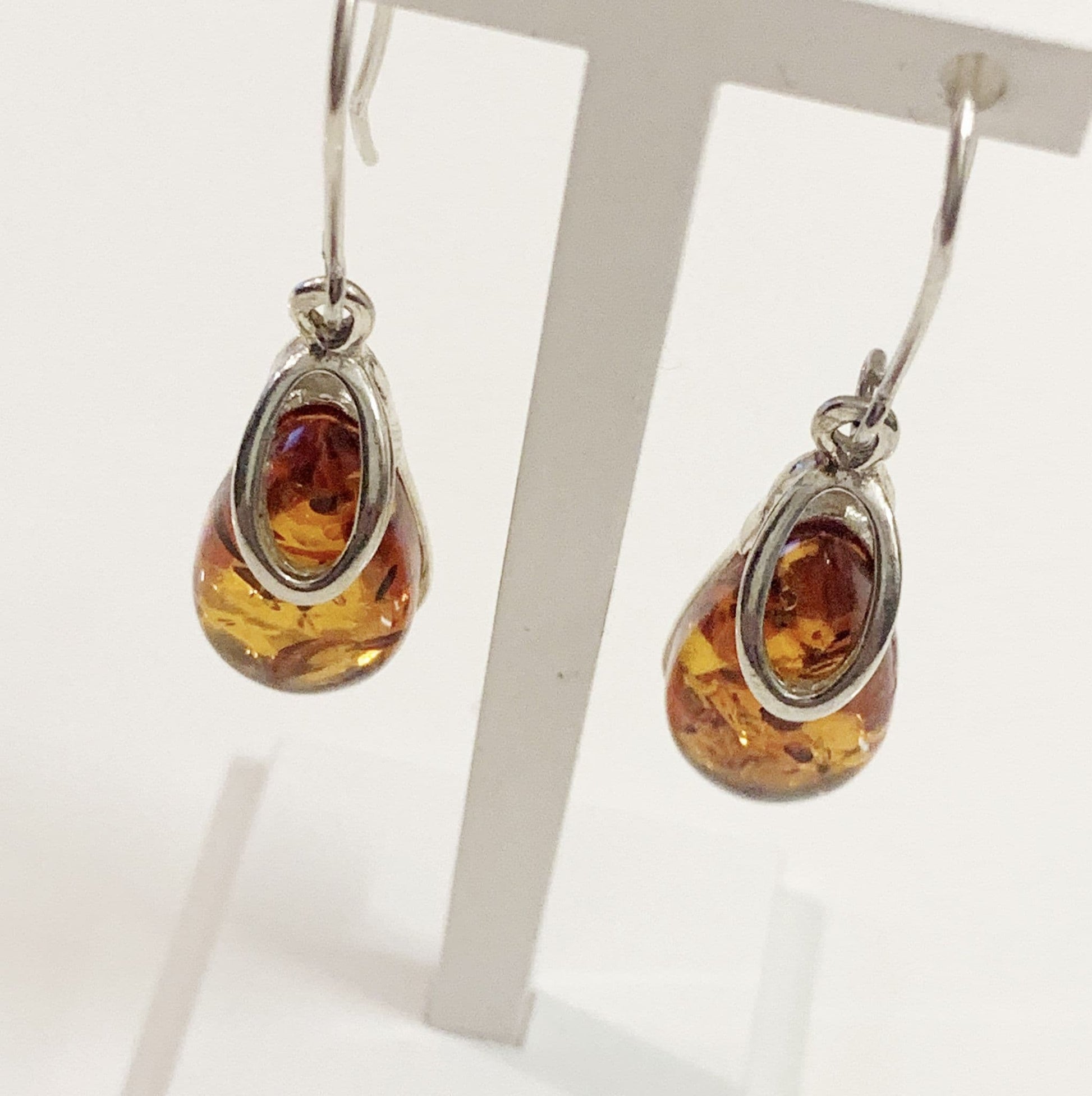 Orange amber tear drop sterling silver earrings