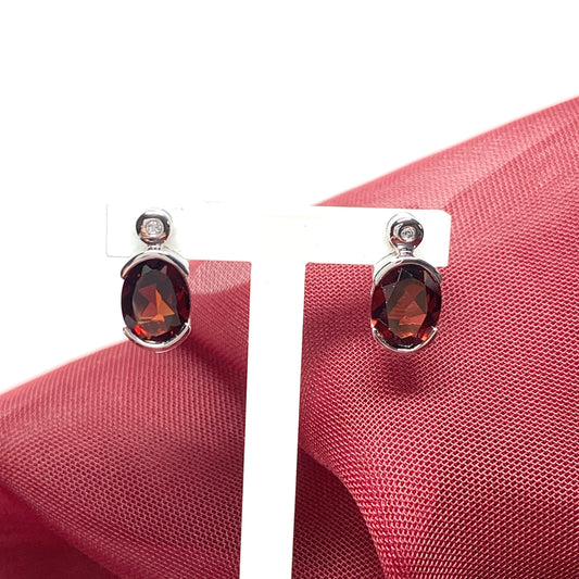 Real red oval garnet and cubic zirconia sterling silver earrings