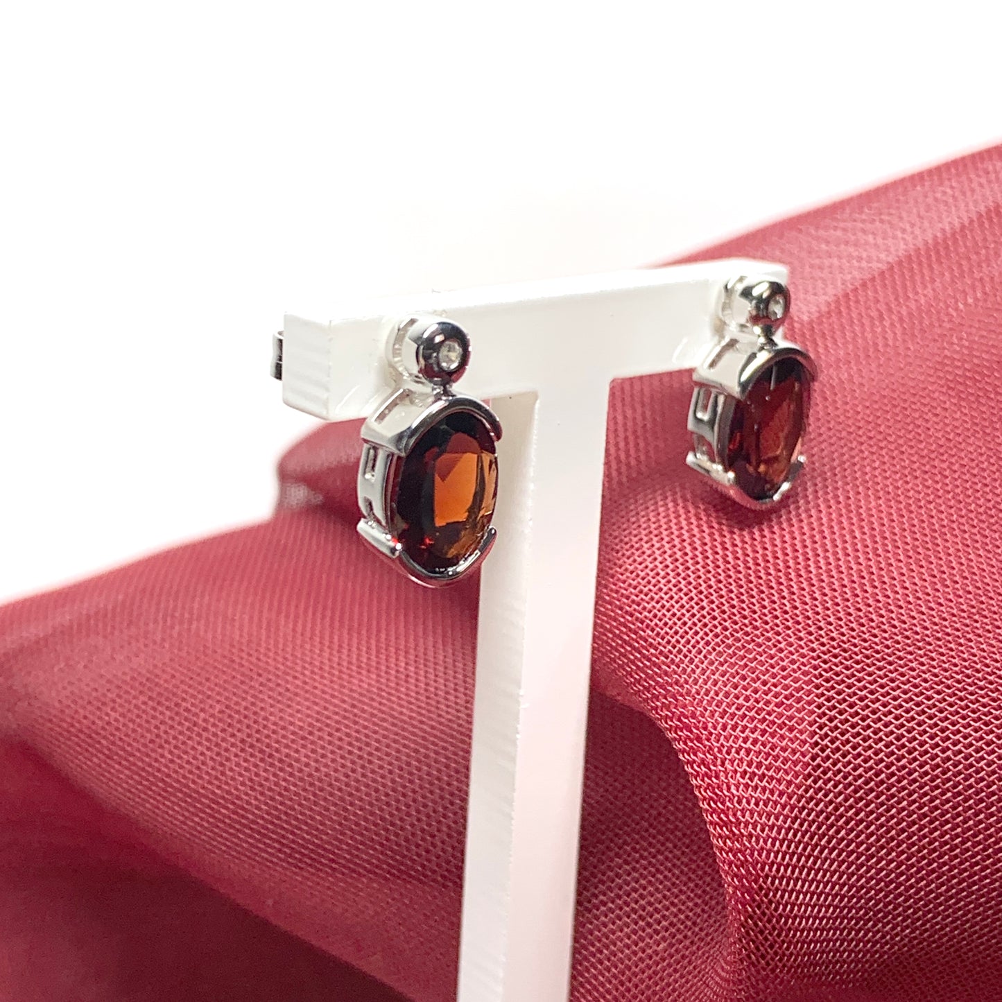 Real red oval garnet and cubic zirconia sterling silver earrings