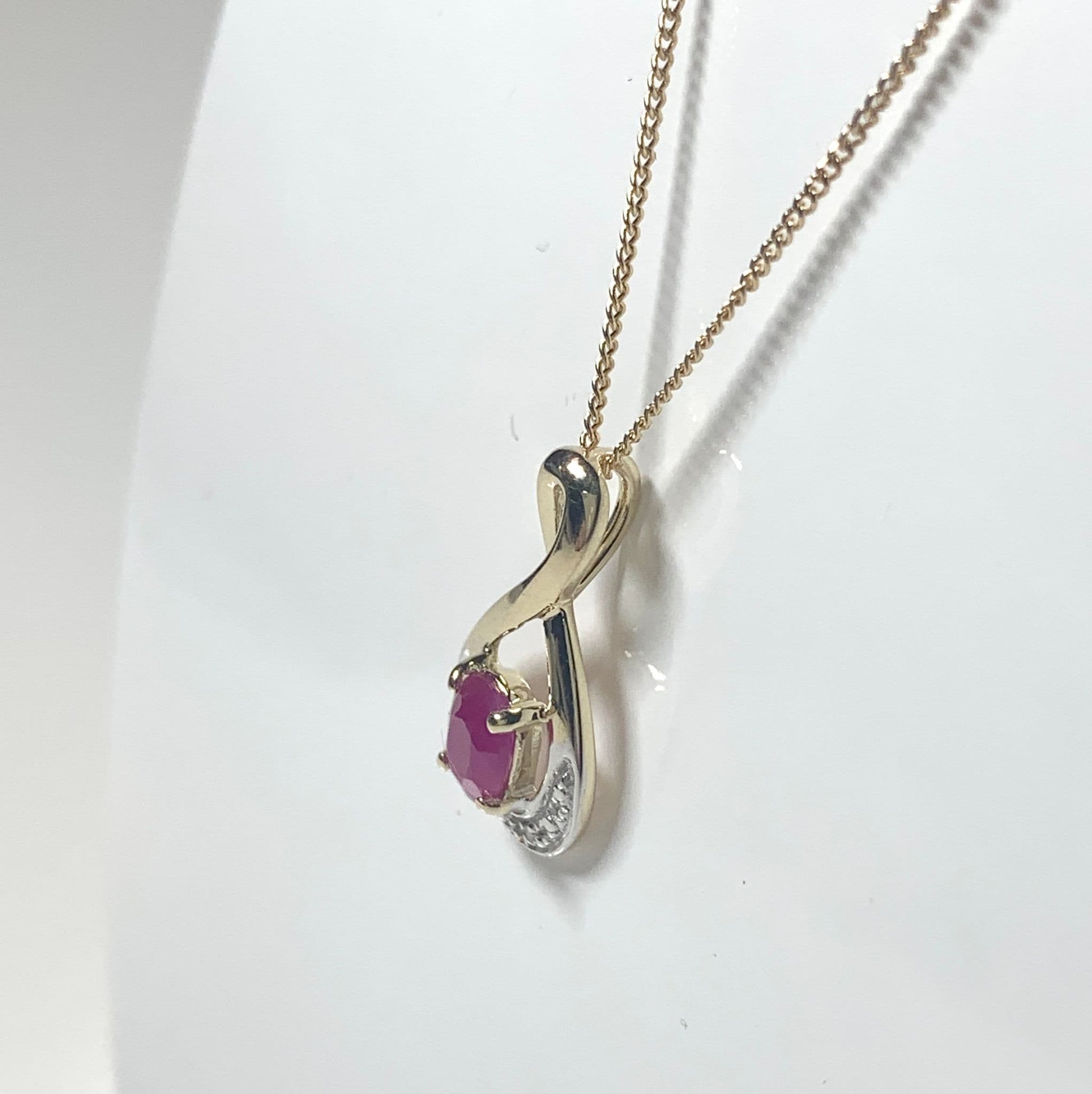 Real red ruby and diamond pierced necklace yellow gold