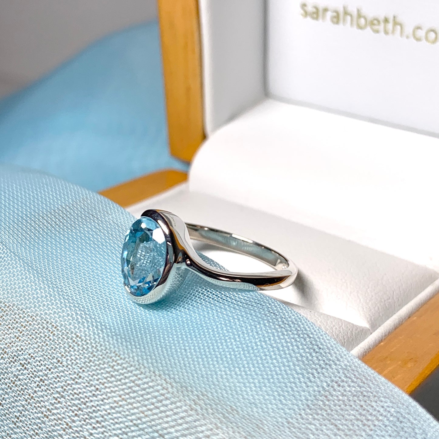 Real blue topaz ring fancy oval swirl sterling silver