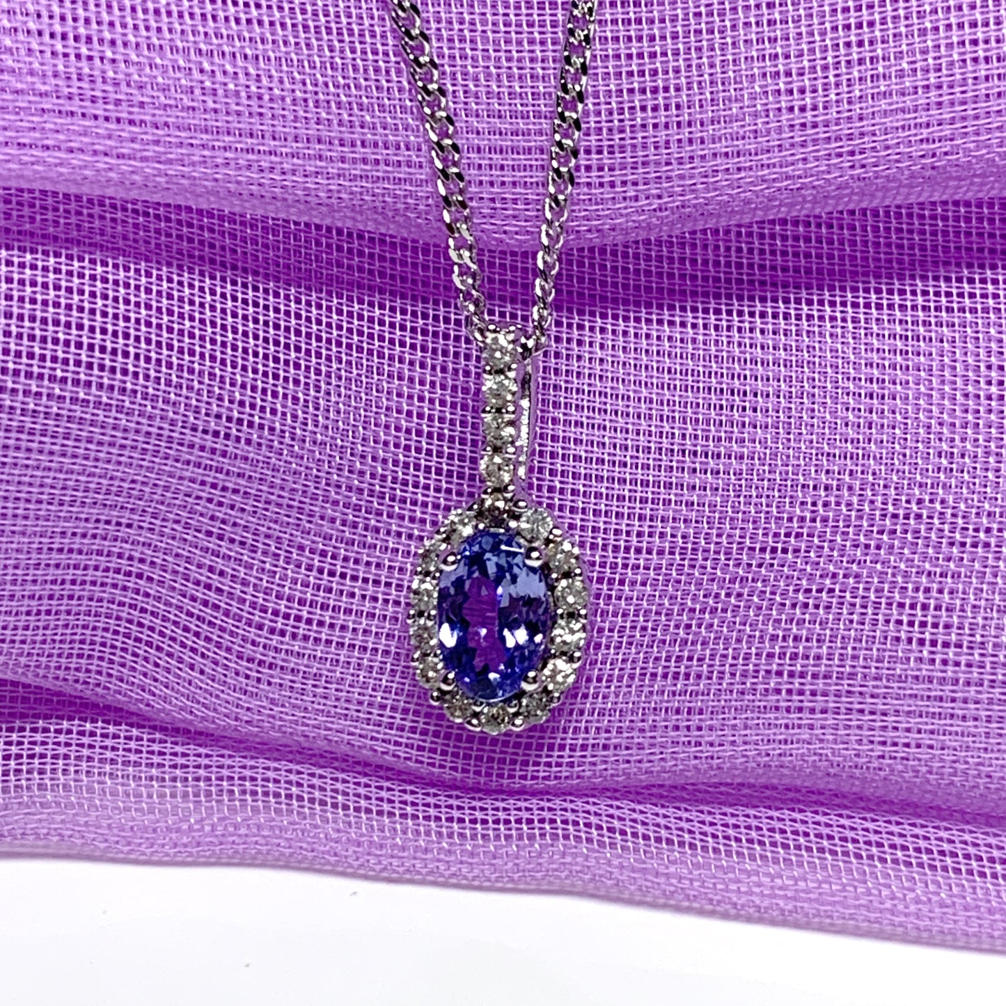 Real tanzanite and diamond white gold oval cluster necklace