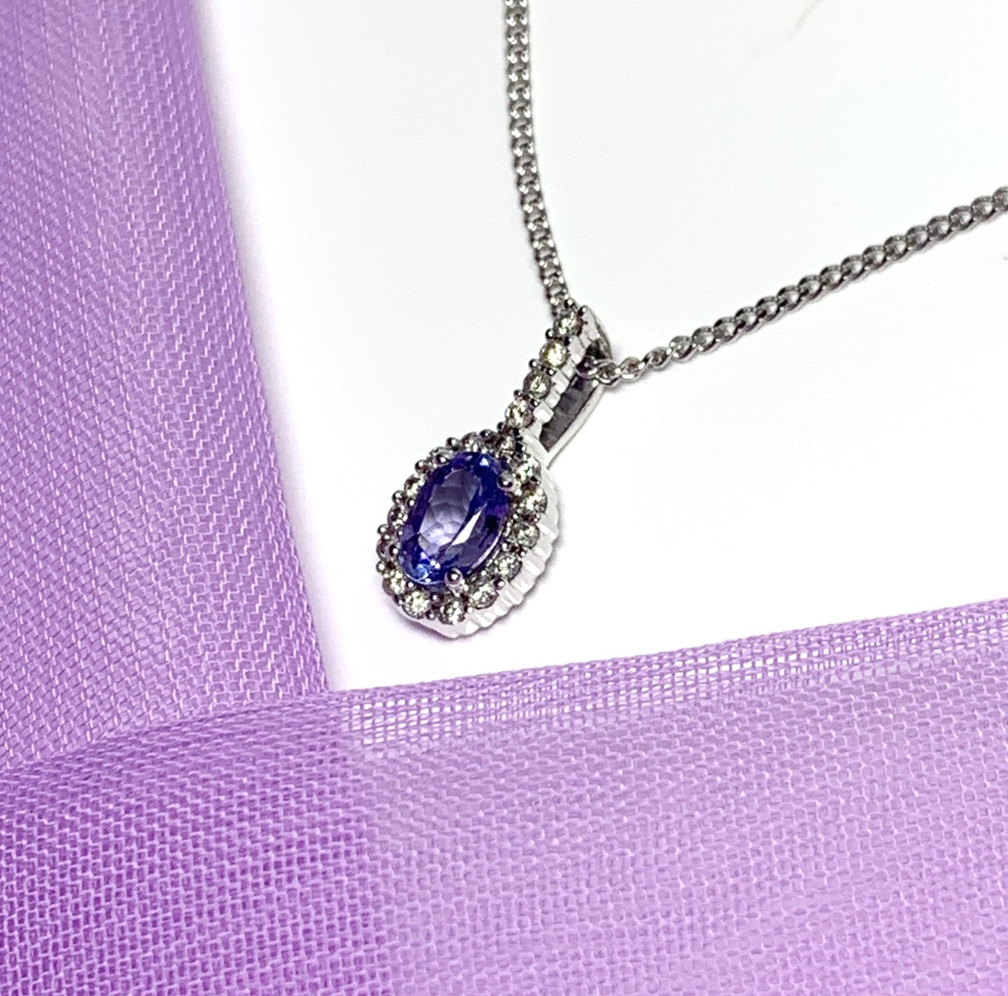 Real tanzanite and diamond white gold oval cluster necklace