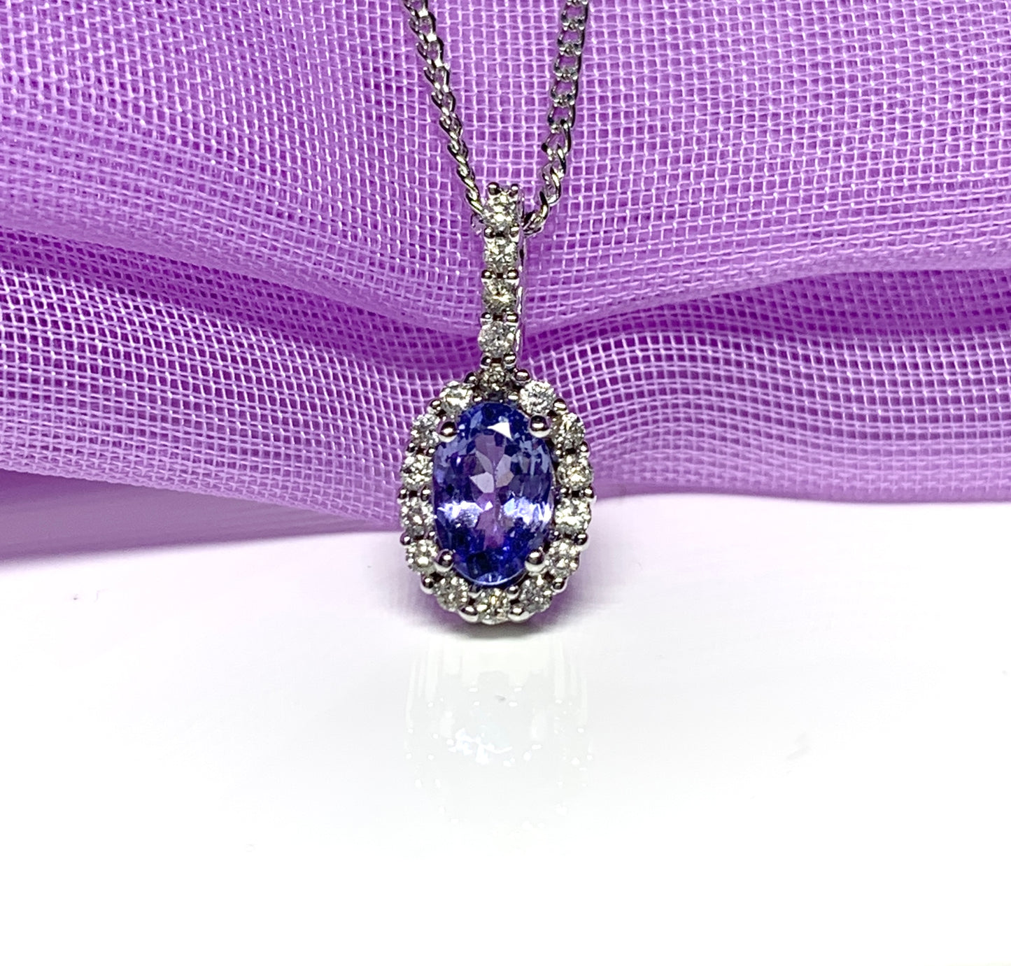 Real tanzanite and diamond white gold oval cluster necklace